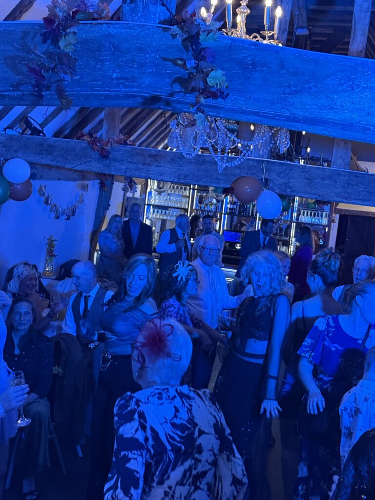 Professional DJ hire Essex for pubs, bars, hotels and event venues, showcasing a lively event atmosphere.